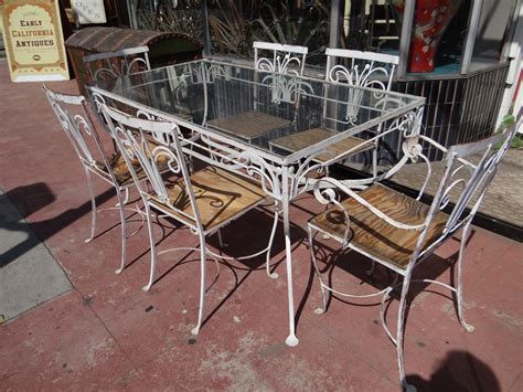 It can be liable to rust so ensure your set has been given an anti rust treatment and keep it stored away during the winter months if possible. . Used wrought iron patio furniture